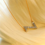 LOUIS VUITTON VOLT SILVER DIAMOND PEDANT NECKLACE