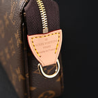 louis-vuitton-pochette-accessoires-monogram-canvas-clutch-bag-brown-with-gold-chain-m82766 Crossbody