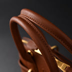 miu-miu-leather-bowler-top-handle-bag-cognac Handle